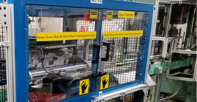 OSHA machine guarding on spin trimmer