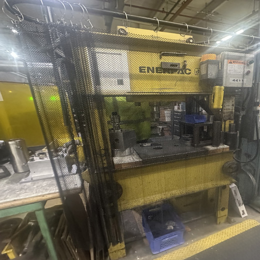 Shop Press with Split Ejection Mesh Curtains